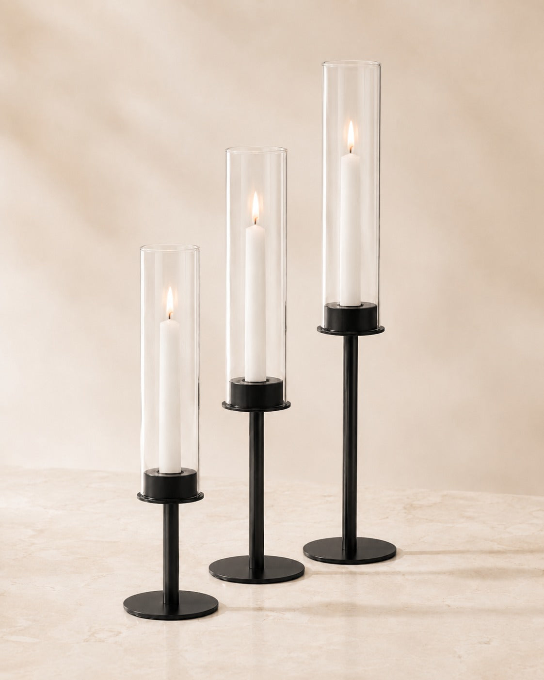 Elegante kandelaars met glazen cilinder in 3 hoogtes