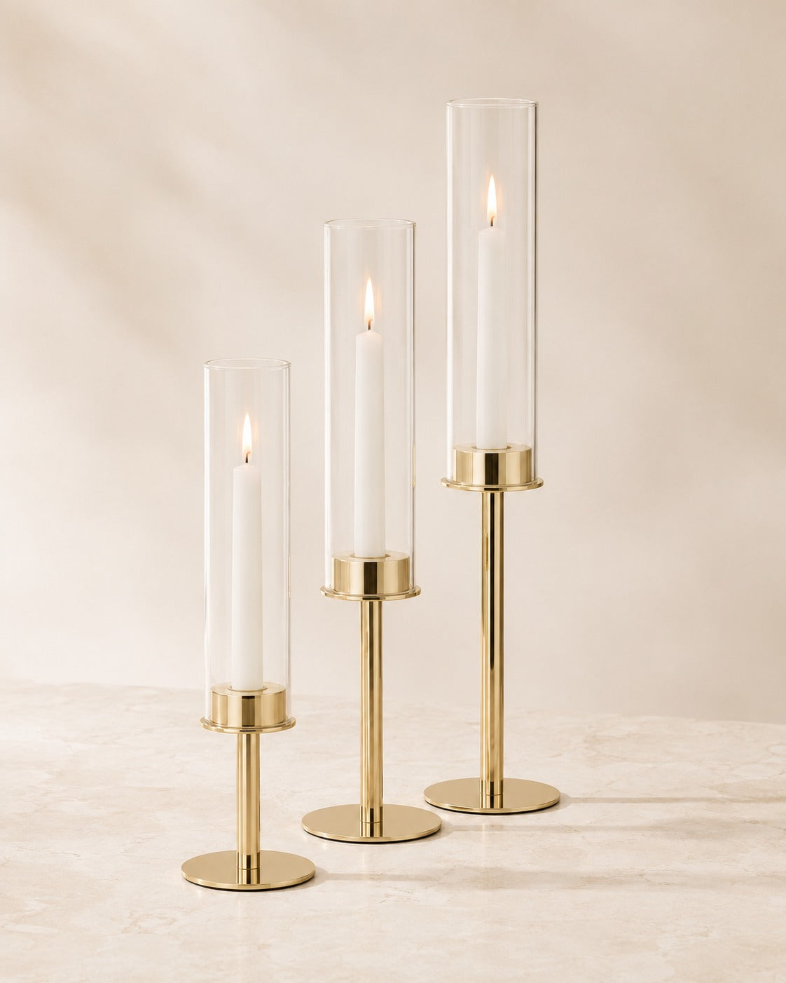 Elegante kandelaars met glazen cilinder in 3 hoogtes