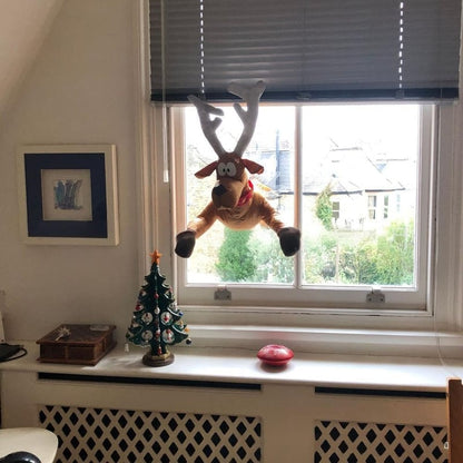 Neerstortende Kerstman en Rendier